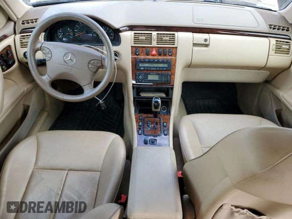 2002 Mercedes-Benz E-Class with VIN WDBJF82JX2X070380, listed as a Copart auction lot 68675974 with 88,274 mi miles and Salvage Title. Bid and sale history available at carsss.com. Image 8.