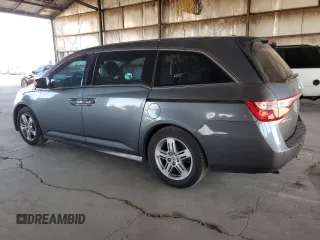 2012 Honda Odyssey Touring с VIN 5FNRL5H91CB138389, выставлен на аукционе Copart как лот 61137135 с пробегом 161 468 миль миль и Чистый • Clean title. История ставок и продаж доступна на DreamBid. Изображение 2.