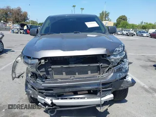 2021 Ford Ranger XL with VIN 1FTER4FHXMLD25744, listed as a IAAI auction lot 42248338 with 74,312 mi miles and . Bid and sale history available at DreamBid. Image 12.