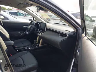 2022 Toyota Corolla Cross XLE with VIN 7MUEAABG1NV038625, listed as a IAAI auction lot 42434536 with 47,983 mi miles and . Bid and sale history available at DreamBid. Image 5.