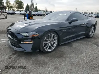 2023 Ford Mustang GT with VIN 1FA6P8CF6P5307129, listed as a Copart auction lot 43021545 with 15,354 mi miles and Salvage Title. Bid and sale history available at carsss.com. Image 1.