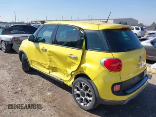 2014 FIAT 500L Trekking with VIN ZFBCFADH3EZ013347, listed as a IAAI auction lot 41551204 with 96,679 mi miles and . Bid and sale history available at DreamBid. Image 3.