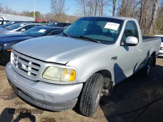 2002 Ford F-150 XL with VIN 1FTRF17222NC00760, listed as a IAAI auction lot 41653940 with 314,637 mi miles. Bid and sale history available at carsss.com. Image 17.