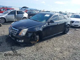 2011 Cadillac CTS Performance with VIN 1G6DL5ED0B0118184, listed as a IAAI auction lot 41721773 with 163,875 mi miles and . Bid and sale history available at DreamBid. Image 2.
