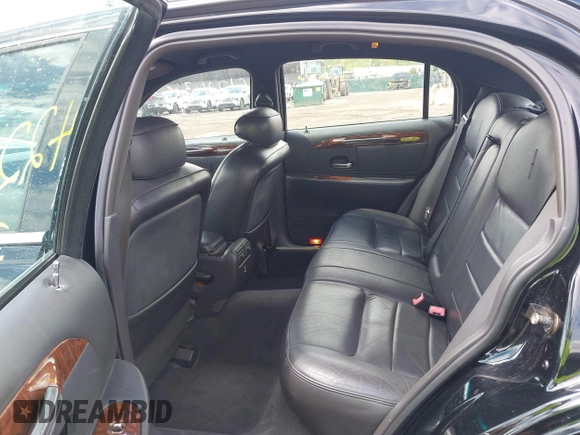 2001 Lincoln Town Car Executive z VIN 1LNHM81W21Y703011, wystawiony jako IAAI lot #42211369 z przebiegiem 188 000 mil mil oraz . Historia ofert i sprzedaży dostępna na DreamBid. Obrazek 8.