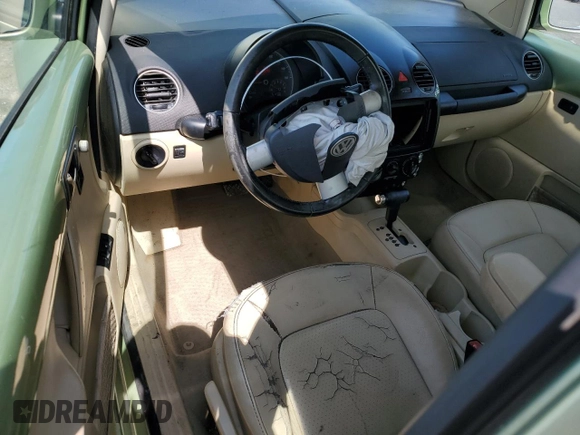 2009 Volkswagen Beetle S with VIN 3VWRW31CX9M510525, listed as a Copart auction lot 60941165 with 132,959 mi miles and Salvage title. Bid and sale history available at DreamBid. Image 8.