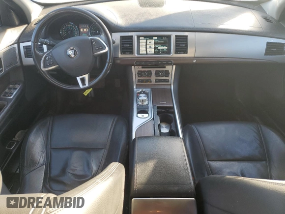 2015 Jaguar XF with VIN SAJXA0FS5FPU49437, listed as a Copart auction lot 84757254 with 99,301 mi miles and Salvage Title. Bid and sale history available at DreamBid. Image 8.