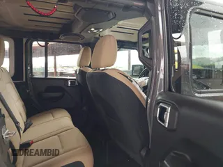 2020 Jeep Wrangler Unlimited Black and Tan с VIN 1C4HJXDG3LW266615, выставлен на аукционе IAAI как лот 42207899 с пробегом 55 291 миль миль и . История ставок и продаж доступна на DreamBid. Изображение 8.