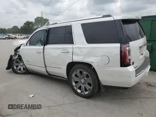 2016 GMC Yukon Denali with VIN 1GKS2CKJ0GR457895, listed as a Copart auction lot 63248354 with 118,005 mi miles and Salvage Title. Bid and sale history available at carsss.com. Image 2.