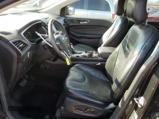 2015 Ford Edge Titanium z VIN 2FMTK3K91FBB52506, wystawiony jako Copart lot #84192474 z przebiegiem 136 437 mil mil oraz Nie do naprawy • Non repairable. Historia ofert i sprzedaży dostępna na DreamBid. Obrazek 7.