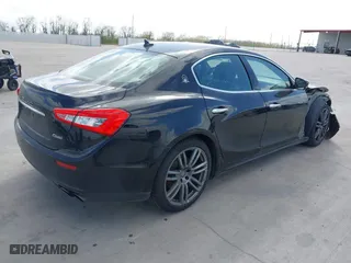 2017 Maserati Ghibli with VIN ZAM57XSA6H1218753, listed as a IAAI auction lot 41833235 with 42,135 mi miles. Bid and sale history available at carsss.com. Image 4.