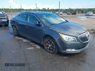 2016 Buick LaCrosse Sport Touring with VIN 1G4G45G34GF266706, listed as a IAAI auction lot 42619621 with 74,190 mi miles and . Bid and sale history available at DreamBid. Image 1.