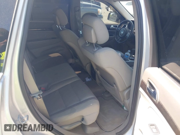 2011 Jeep Grand Cherokee 70th Anniversary with VIN 1J4RR4GG8BC515170, listed as a IAAI auction lot 42135654 with 208,638 mi miles. Bid and sale history available at carsss.com. Image 8.