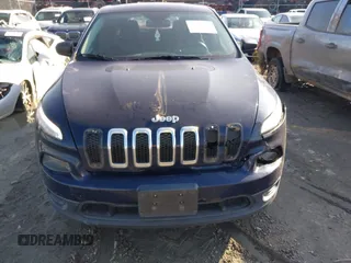 2015 Jeep Cherokee Sport with VIN 1C4PJLAB2FW547371, listed as a IAAI auction lot 41588682 with 135,640 mi miles. Bid and sale history available at carsss.com. Image 12.