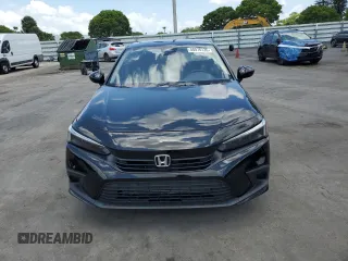 2024 Honda Civic EX-L z VIN 19XFL1H74RE001908, wystawiony jako Copart lot #58576135 z przebiegiem 31 455 mil mil oraz Tytuł czysty. Historia ofert i sprzedaży dostępna na DreamBid. Obrazek 5.