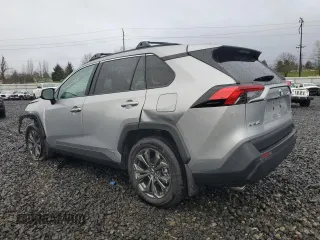 2024 Toyota RAV4 Hybrid XLE Premium with VIN 2T3B6RFV6RW066043, listed as a Copart auction lot 43470115 with 9,454 mi miles and Salvage Title. Bid and sale history available at DreamBid. Image 2.
