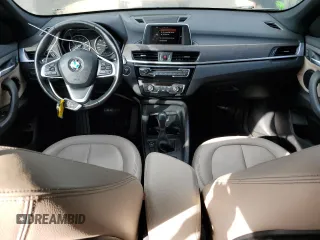 2017 BMW X1 xDrive28i with VIN WBXHT3C32H5F71690, listed as a Copart auction lot 60852375 with 67,475 mi miles and Salvage title. Bid and sale history available at DreamBid. Image 8.