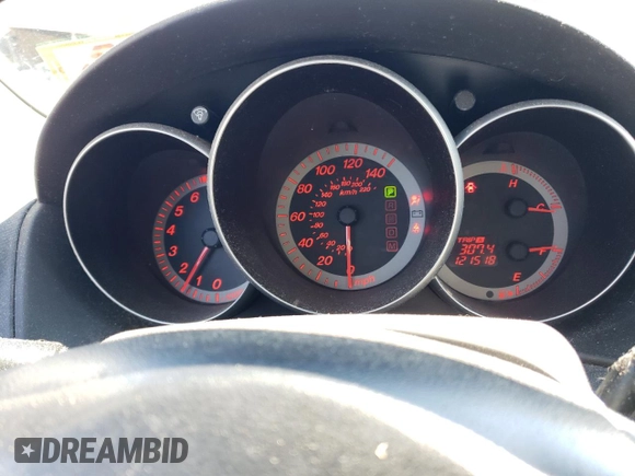 2007 Mazda 3 S Touring with VIN JM1BK324771641980, listed as a Copart auction lot 61132664 with 121,518 mi miles and Salvage Title. Bid and sale history available at DreamBid. Image 9.