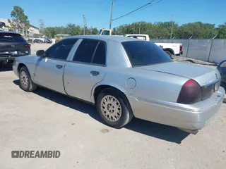 2003 Mercury Grand Marquis GS Convenience with VIN 2MEFM74W63X629935, listed as a IAAI auction lot 42048640 with 114,144 mi miles and . Bid and sale history available at DreamBid. Image 3.