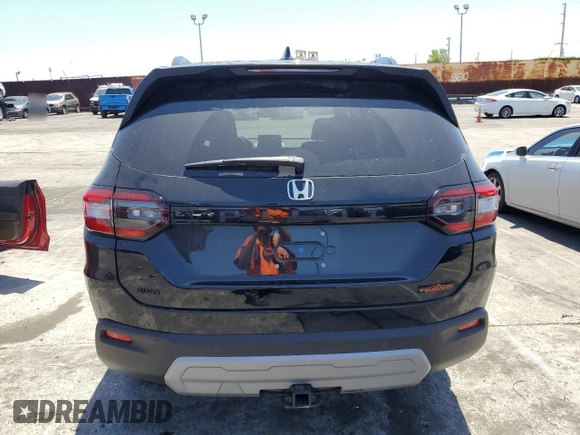 2025 Honda Pilot TrailSport with VIN 5FNYG1H62SB101798, listed as a Copart auction lot 55340585 with 1,065 mi miles and Salvage title. Bid and sale history available at DreamBid. Image 6.