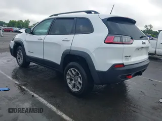 2022 Jeep Cherokee Trailhawk z VIN 1C4PJMBX1ND500729, wystawiony jako IAAI lot #42235098 z przebiegiem 60 354 mil mil oraz . Historia ofert i sprzedaży dostępna na DreamBid. Obrazek 3.