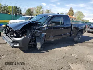 2017 Toyota Tacoma SR z VIN 5TFSX5ENXHX057041, wystawiony jako Copart lot #56187245 z przebiegiem 97 281 mil mil oraz Szkoda całkowita • Salvage title. Historia ofert i sprzedaży dostępna na DreamBid. Obrazek 1.