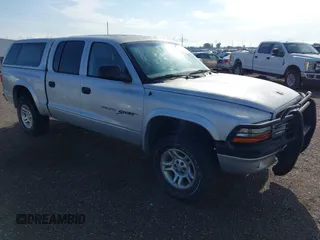 2001 Dodge Dakota Sport z VIN 1B7HG2AN91S290457, wystawiony jako IAAI lot #42381350 z przebiegiem 192 163 mil mil oraz . Historia ofert i sprzedaży dostępna na DreamBid. Obrazek 1.