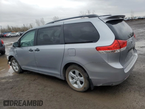2012 Toyota Sienna with VIN 5TDZK3DC1CS213175, listed as a Copart auction lot 55475615 with 216,082 mi miles and Salvage title. Bid and sale history available at DreamBid. Image 2.