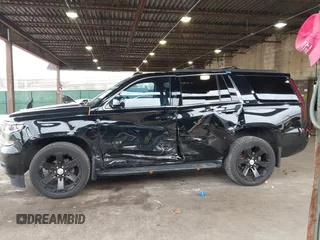2015 Chevrolet Tahoe LT with VIN 1GNSKBKCXFR604401, listed as a IAAI auction lot 42048559 with 60,768 mi miles and . Bid and sale history available at DreamBid. Image 14.