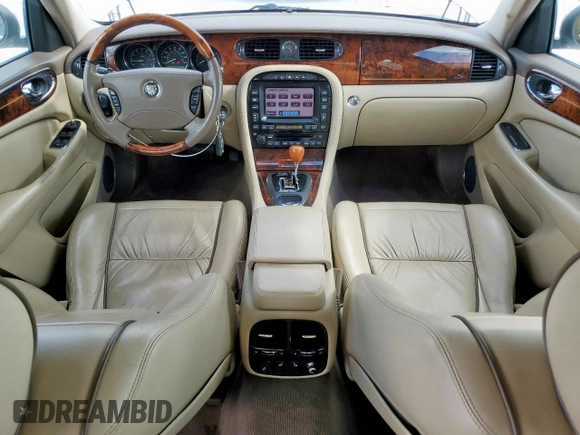 2006 Jaguar XJ Vanden Plas with VIN SAJWA82B16SH06996, listed as a Copart auction lot 62509025 with 80,236 mi miles and Salvage title. Bid and sale history available at DreamBid. Image 8.