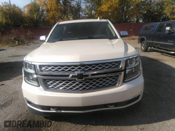 2015 Chevrolet Suburban LTZ with VIN 1GNSKKKC0FR551031, listed as a IAAI auction lot 40694559 with 184,261 mi miles. Bid and sale history available at carsss.com. Image 12.
