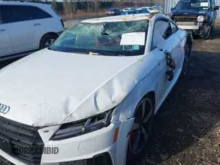 2023 Audi TTS with VIN TRUA1AFV0P1007101, listed as a IAAI auction lot 41800664 with 2,021 mi miles and . Bid and sale history available at DreamBid. Image 18.