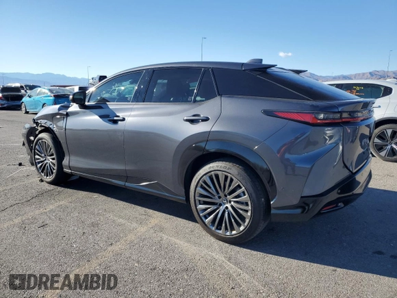 2024 Lexus RZ 300e Premium z VIN JTJABABB4RA005239, wystawiony jako Copart lot #79508374 z przebiegiem 4177 mil mil oraz Szkody całkowita. Historia ofert i sprzedaży dostępna na DreamBid. Obrazek 2.