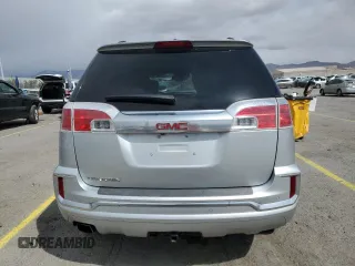 2017 GMC Terrain Denali z VIN 2GKALREK9H6104536, wystawiony jako Copart lot #51504095 z przebiegiem 63 094 mil mil oraz Szkoda całkowita • Salvage title. Historia ofert i sprzedaży dostępna na DreamBid. Obrazek 6.