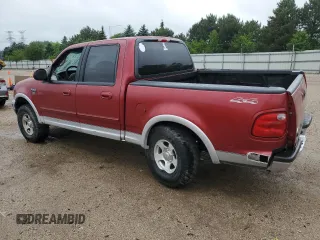 2001 Ford F-150 XLT with VIN 1FTRW08L41KB01407, listed as a Copart auction lot 59446555 with 285,312 mi miles and Salvage title. Bid and sale history available at DreamBid. Image 2.
