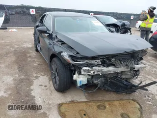 2021 Honda Accord EX-L with VIN 1HGCV1F5XMA065883, listed as a IAAI auction lot 42168080 with 107,628 mi miles and . Bid and sale history available at DreamBid. Image 1.