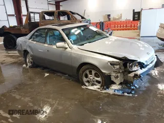 2001 Lexus ES 300 with VIN JT8BF28G010310038, listed as a IAAI auction lot 41273421 with 161,858 mi miles. Bid and sale history available at carsss.com. Image 1.