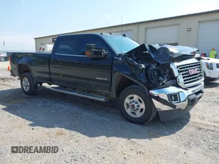 2017 GMC Sierra 2500HD SLE z VIN 1GT12SEG6HF158237, wystawiony jako IAAI lot #42277428 z przebiegiem 119 775 mil mil oraz . Historia ofert i sprzedaży dostępna na DreamBid. Obrazek 1.