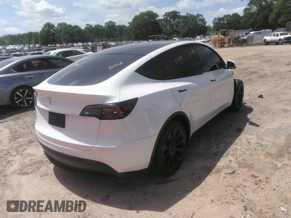 2022 Tesla Model Y Long Range z VIN 7SAYGDEE3NF385933, wystawiony jako IAAI lot #42059675 z przebiegiem 88 488 mil mil oraz . Historia ofert i sprzedaży dostępna na DreamBid. Obrazek 4.