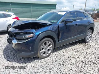 2021 Mazda CX-30 Premium z VIN 3MVDMBDL7MM236474, wystawiony jako IAAI lot #42284515 z przebiegiem 58 565 mil mil oraz . Historia ofert i sprzedaży dostępna na DreamBid. Obrazek 17.