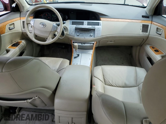 2006 Toyota Avalon XL z VIN 4T1BK36B36U084230, wystawiony jako Copart lot #59911975 z przebiegiem 134 984 mil mil oraz Szkoda całkowita • Salvage title. Historia ofert i sprzedaży dostępna na DreamBid. Obrazek 8.