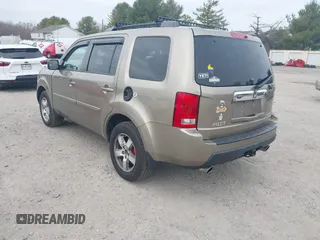2011 Honda Pilot EX-L with VIN 5FNYF4H68BB038615, listed as a IAAI auction lot 41785830 with 164,324 mi miles and . Bid and sale history available at carsss.com. Image 3.