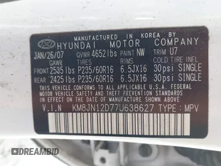 2007 Hyundai Tucson SE with VIN KM8JN12D77U638627, listed as a IAAI auction lot 41551224 with 156,125 mi miles. Bid and sale history available at carsss.com. Image 9.