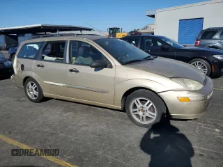 2001 Ford Focus SE with VIN 1FAFP36371W363523, listed as a Copart auction lot 77208164 with Not Provided miles and Salvage Title. Bid and sale history available at carsss.com. Image 4.