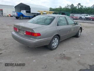 2001 Toyota Camry CE with VIN 4T1BG28K11U040227, listed as a IAAI auction lot 42220307 with 212,125 mi miles and . Bid and sale history available at DreamBid. Image 4.