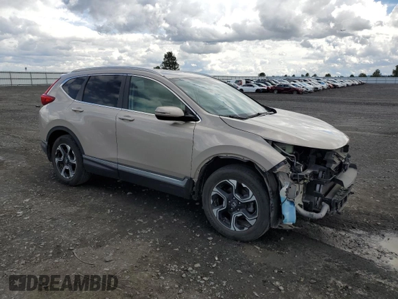 2018 Honda CR-V Touring with VIN 5J6RW2H98JL002657, listed as a Copart auction lot 55075965 with 61,327 mi miles and Salvage Title. Bid and sale history available at DreamBid. Image 4.