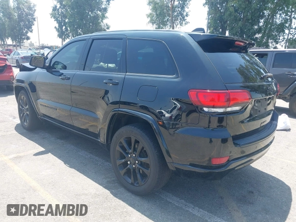 2018 Jeep Grand Cherokee Altitude with VIN 1C4RJEAG2JC428536, listed as a IAAI auction lot 42472960 with 74,631 mi miles and . Bid and sale history available at DreamBid. Image 3.