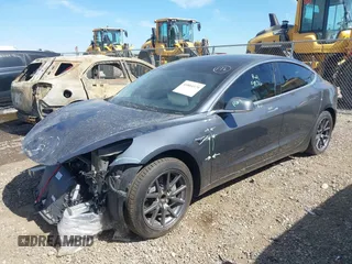 2019 Tesla Model 3 Mid Range with VIN 5YJ3E1EA5KF327679, listed as a IAAI auction lot 41804379 with 87,208 mi miles and . Bid and sale history available at DreamBid. Image 21.