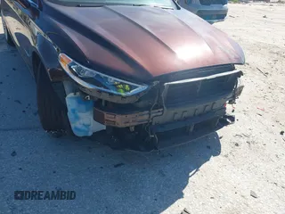 2019 Ford Fusion Hybrid Titanium with VIN 3FA6P0RU2KR123786, listed as a IAAI auction lot 41857026 with 49,604 mi miles. Bid and sale history available at carsss.com. Image 19.
