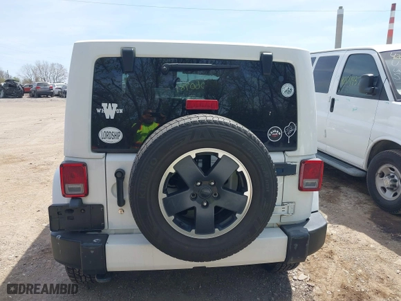 2012 Jeep Wrangler Unlimited Sahara with VIN 1C4HJWEG3CL254944, listed as a IAAI auction lot 42060981 with 172,358 mi miles. Bid and sale history available at carsss.com. Image 16.